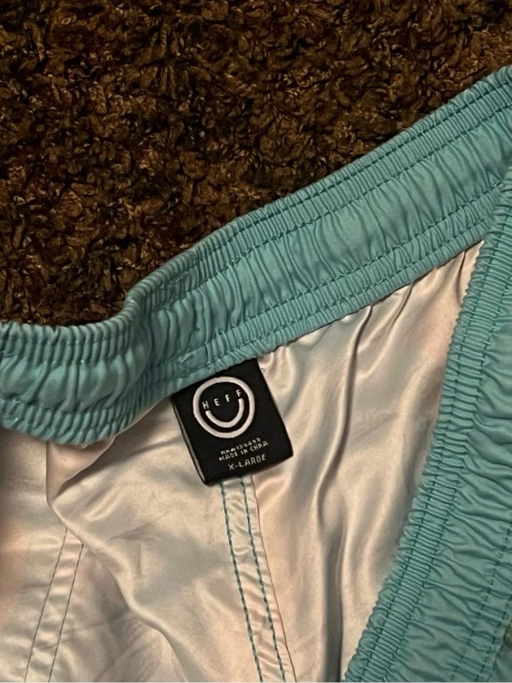 Neff Men’s Light Blue Swim Trunks with Orange Rubber Duck Print